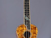 A master grade concert ukulele with 12th fret hibiscus inlay