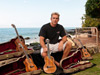 Eric DeVine with a few of his ukuleles at his home in Maui, Hawaii